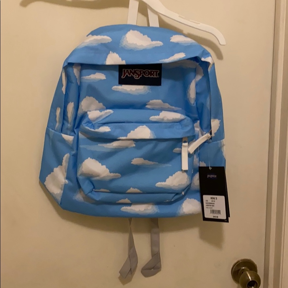 Jansport standard size, blue sky with clouds